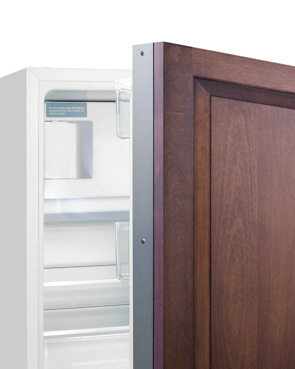 Built-in undercounter ADA compliant refrigerator-freezer in white with a panel-ready door for residential use, manual defrost with glass shelves, and door storage